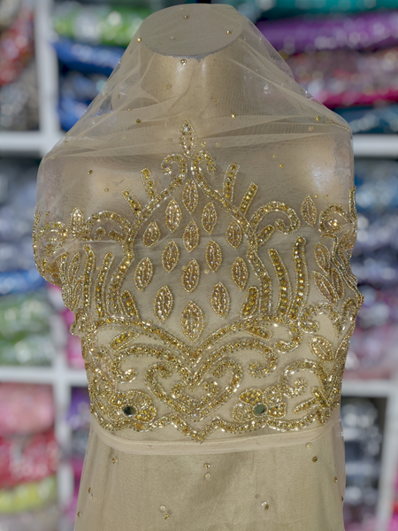 Gold Design on Beige Background Handwork George