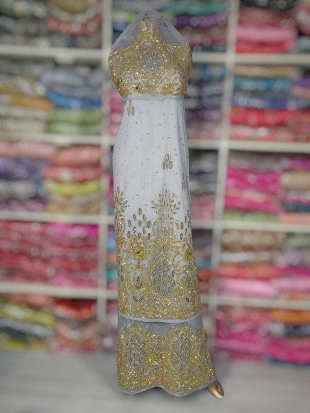 Gold Design on Light Gray Background Handwork George