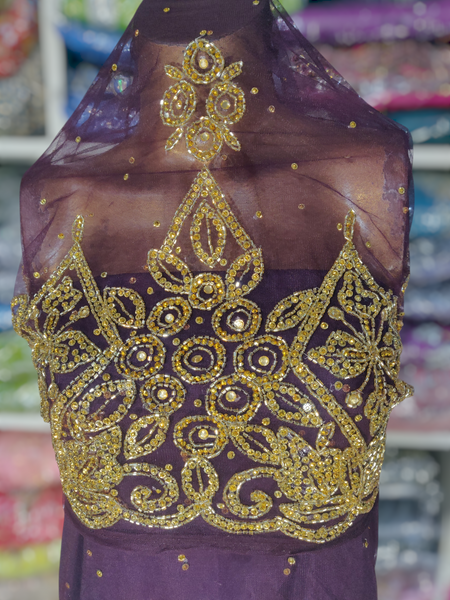 Gold Design on Dark Purple Background Handwork George