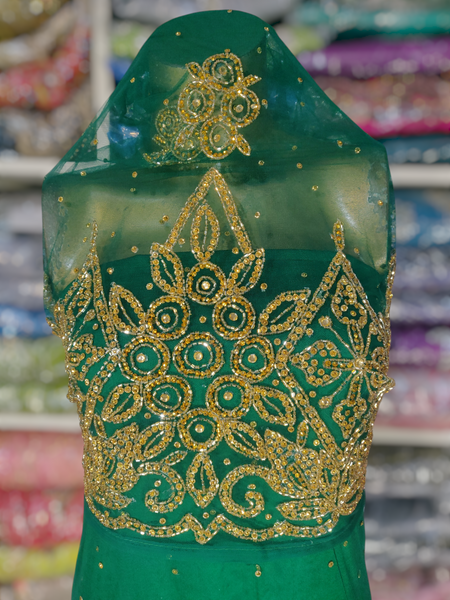 Gold Design on Green Background Handwork George