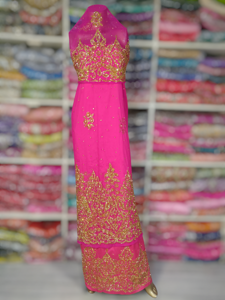 Gold Design on Dark Pink Background Handwork George