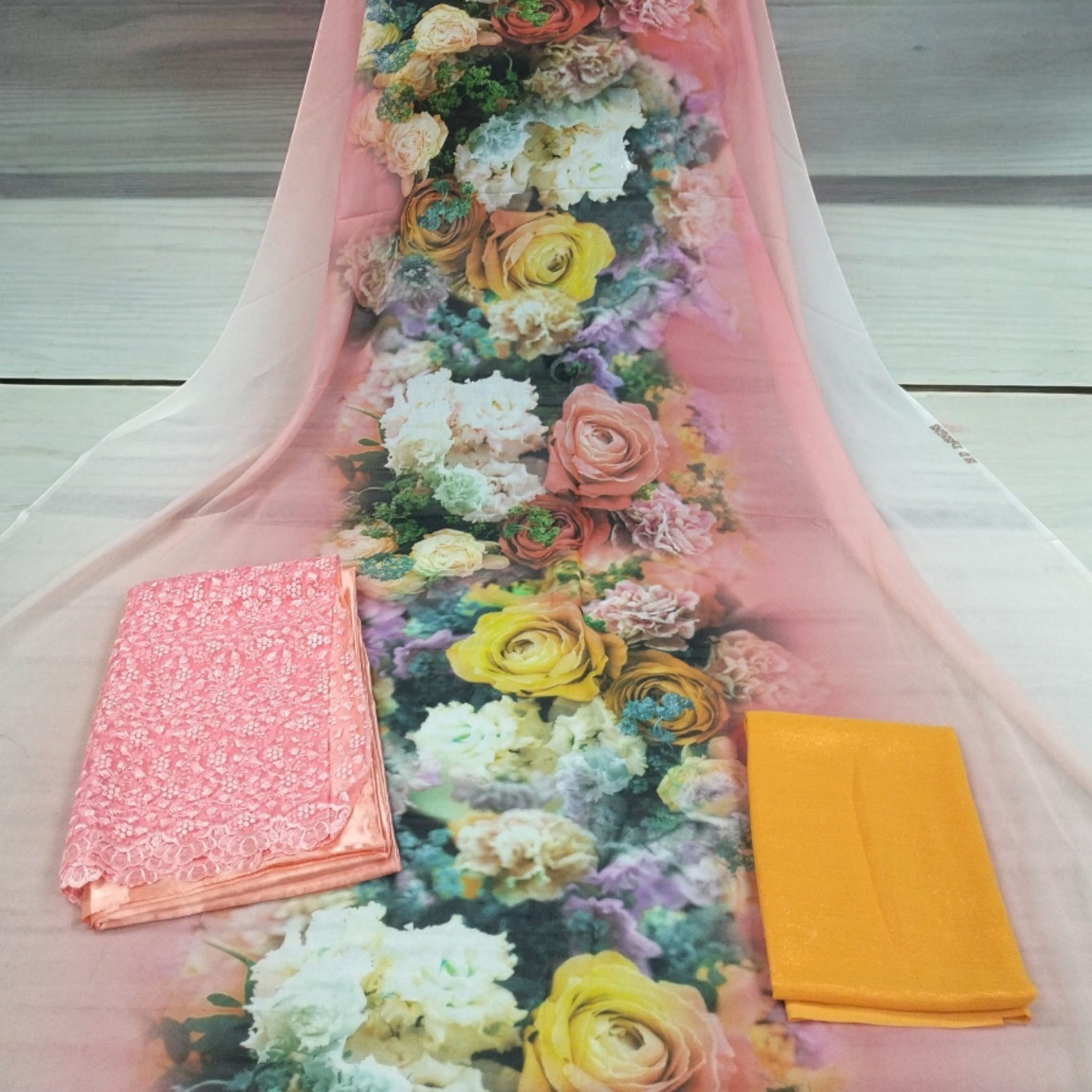 Pink, Yellow, Orange, Dark Green, and White Floral on Pink Background Fransawi Dirac