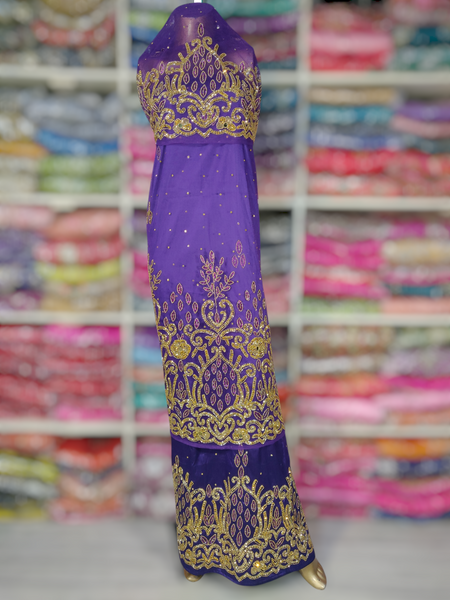 Gold Design on Purple Background Handwork George