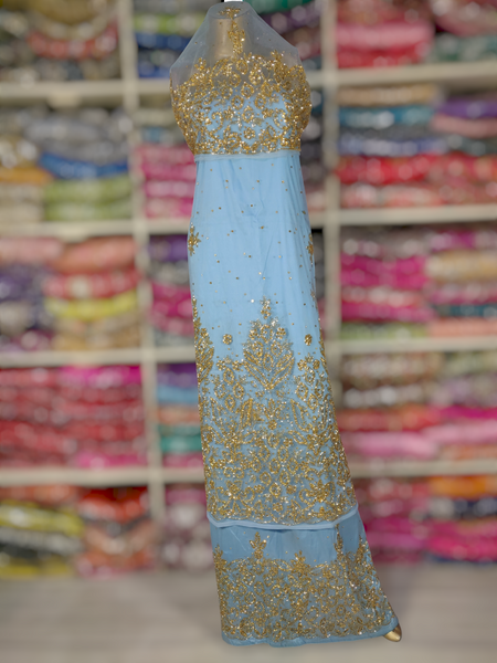 Second Gold Design on Light Blue Background Handwork George